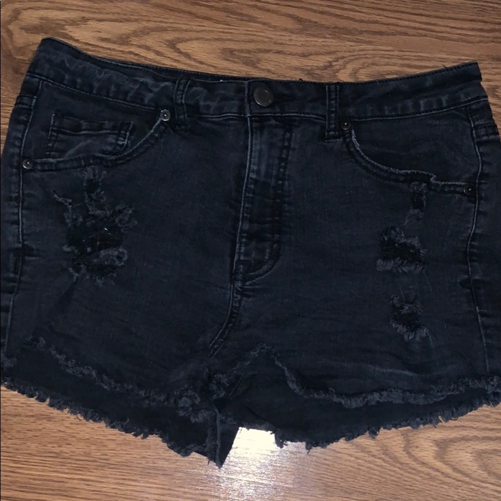 Black ripped denim shorts